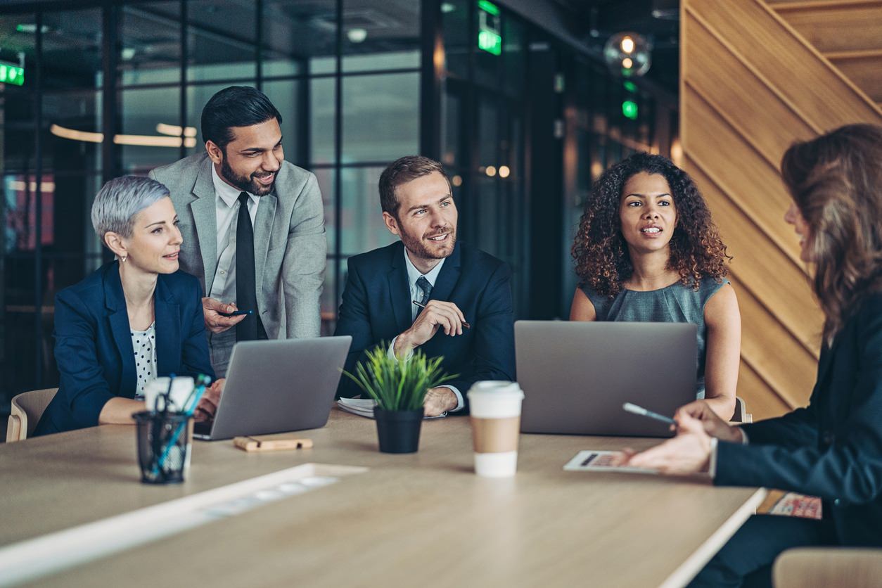 management team conducting annual marketing planning