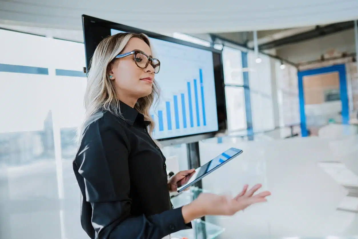 woman conducting annual marketing planning meeting